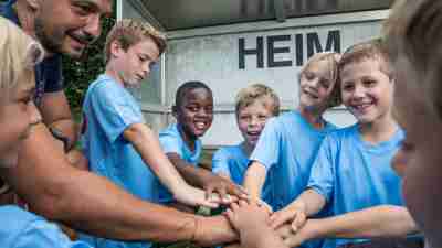 Sports huddle, boys, sportsmanship